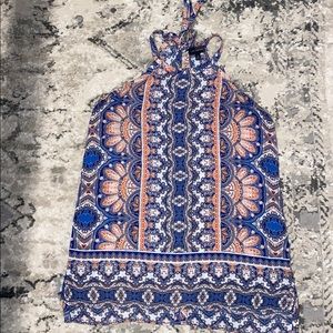 high neck sleeveless blouse